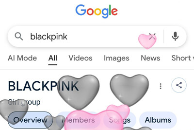 صفحة نتائج BLACKPINK في بحث Google مع زر قلب وضباب وردي وقلوب سوداء ووردية